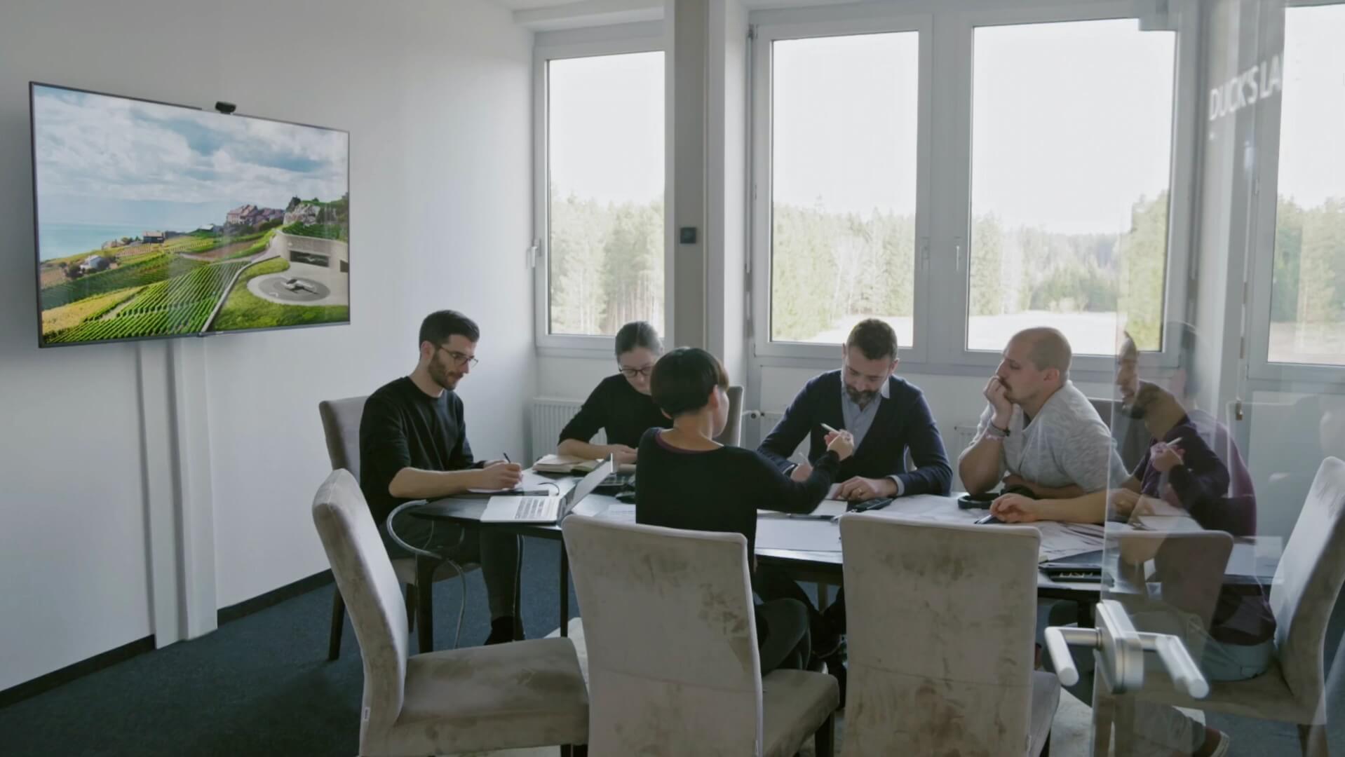 Lilium employees working at a desk